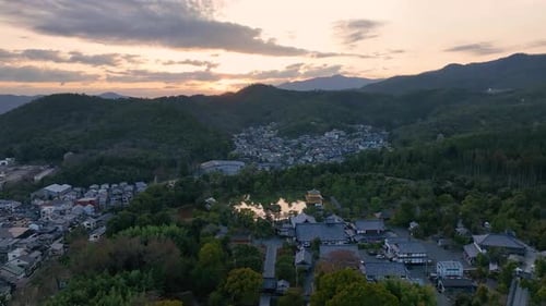 Aerial view of the Kinkaku-ji Temple with mountains, Japan.