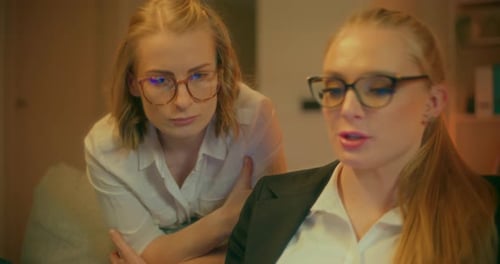 Young Adults Working Together in Office Environment