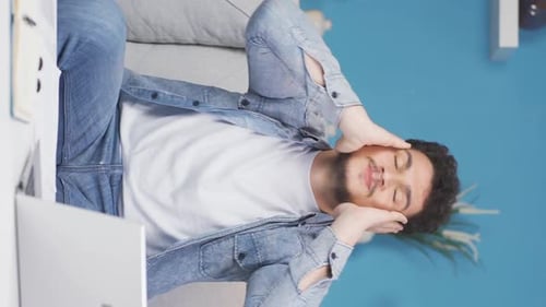 Vertical video of The man having a nervous breakdown is angry and does not feel well.