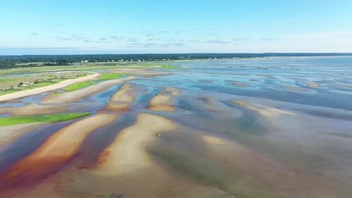 Cape Cod Bay Aerial Drone Footage of Bay Side Beach at Low Tide with Sand Dunes and People Walking i