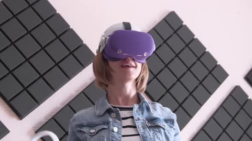 Young Adult Playing Virtual Reality Game at Home