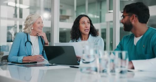 Collaboration, documents and medical with people in boardroom of hospital for meeting