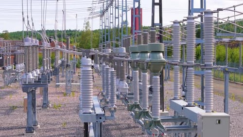 High voltage electrical substation for grid power supply, trucking shot