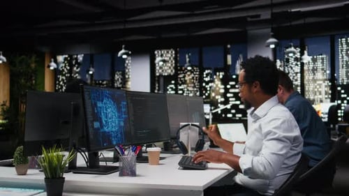 Tech Startup IT Specialist Developing AI Algorithms in Office Listening Music