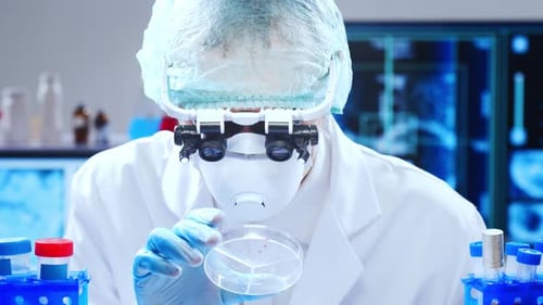 Scientist Analyzing Petri Dish in Lab Close Up