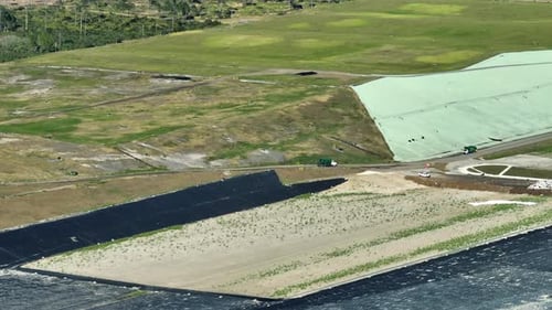 Aerial Shot of a Green Rural Landfill