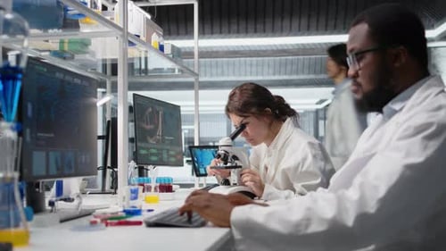 Scientists Working in Modern Laboratory on Medical Research