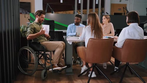 Diverse Team Meeting in Modern Office