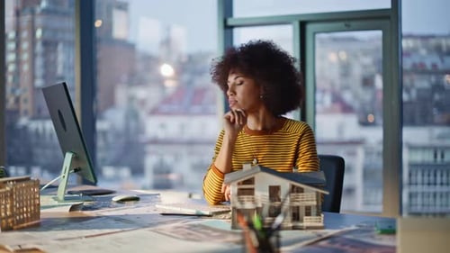 Building Designer Satisfied Model Residential House at Office Smiling Woman