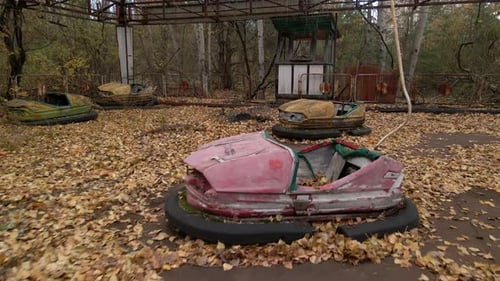 Abandoned Bumper Cars in the Amusement Park of Ghost Town Pripyat