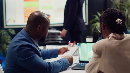 Diverse Team of Specialists Developing Corporate Communications Strategies