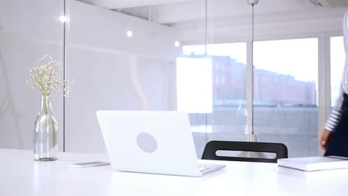 Woman Coming to Office After Completing Work