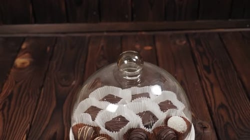 Closeup of a Tray of Sugarfree Chocolates on a Wooden Background