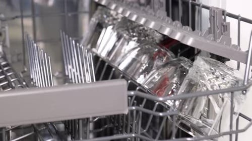Dishwasher Interior with Clean Glasses Close-Up