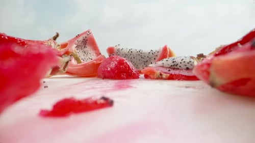 Close-up of Cut Dragon Fruit Slices on White