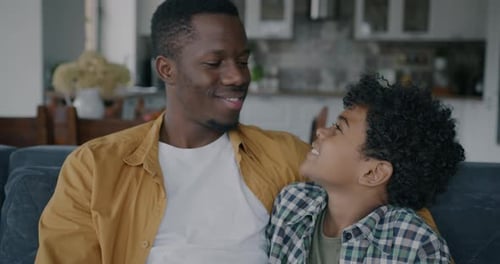 Cheerful Father and Son Enjoying Quality Time