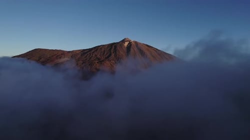 Mountain range in dry deserted landscape of Teide National Park. Scenery of highest volcano