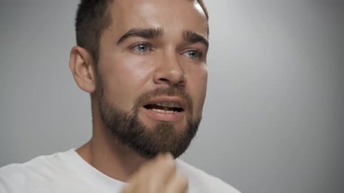 Man Takes Pill and Drinks Water