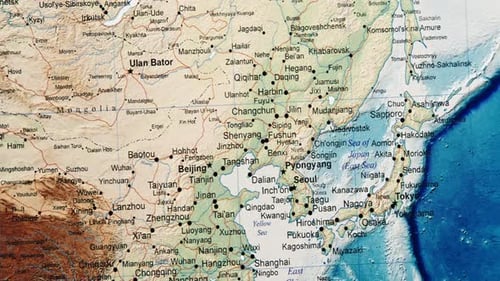 Camera Pans Across East Asia on a Colorful Map