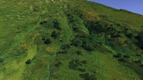 View from the high track in caucasus mountains glaciers, green grass, wild lakes