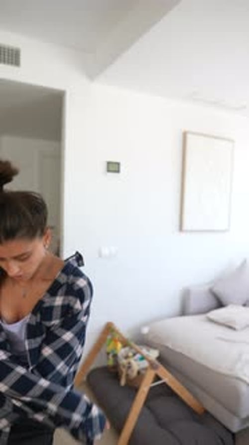 Young Woman Dances Barefoot at Home