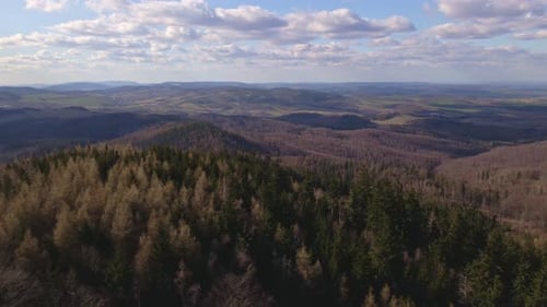 Drone Flight Over Mountains Covered with Forest and Valleys