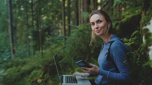 Digital Nomad in the Sunset Forest