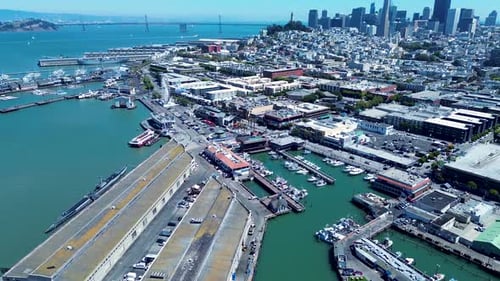 Drone aerial landscape of San Francisco Fisherman's Wharf pier in downtown city main street CBD buil