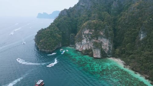 Picturesque Tropical Island with Boats and Turquoise Waters