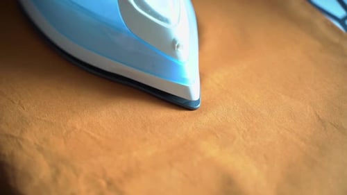 The Iron Irons the Fabric Ironing Clothes at Home Cotton Fabric and Steam Laundry Washing Household