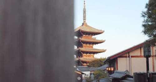 Slide shot of a temple during sunrise in Kyoto, Japan 4K slow motion