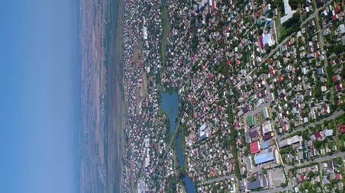 Vertical Video Aerial View of the Ukrainian City with Districts and Buildings
