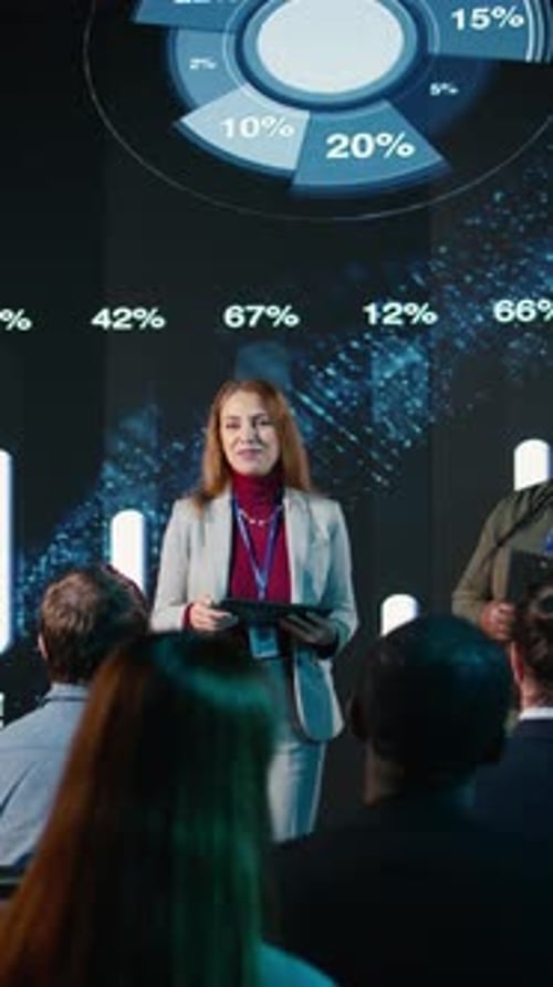 Vertical Video Multiethnic Female Adults Hosting a Panel Discussion with Market Share Trends