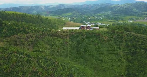Aerial shot of farmers living on lush mountainside, Huila, Colombia
