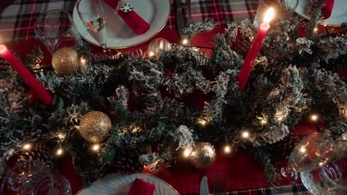 Festive Holiday Table Setting with Christmas Garland