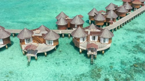 Luxury Overwater Villas From Above on Tropical Sea