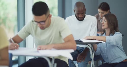 Young Adults in Classroom Setting Taking a Test
