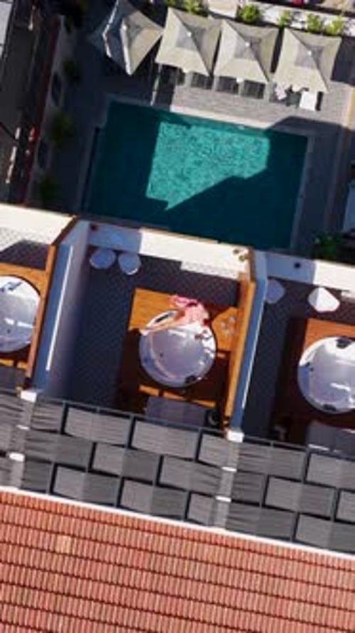 Vertical Video of Cozy Seaside Hotel With Mediterranean Water and Beach