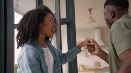 Couple Dancing Together Happily at Home