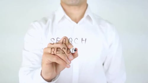 Writing the Words "Search Results" on Clear Surface