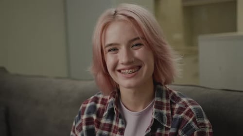 Smiling Young Adult with Braces Close-Up