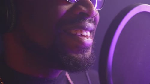 Professional Singer Recording a Song in Music Studio