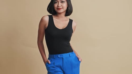 Young Woman Posing in Fashionable Clothing