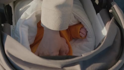 Close Up of Baby Resting in Stroller