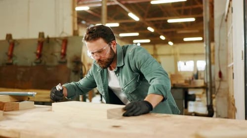 Carpentry, woodworking and man in workshop with dust on wood for furniture
