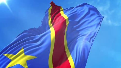 Democratic Republic of Congo Flag Waving in Blue Sky