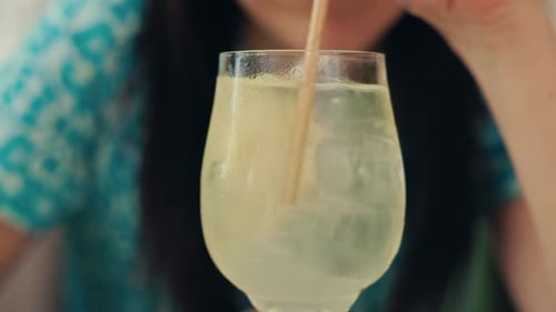 Refreshing Drink with Lemon and Ice Close-Up