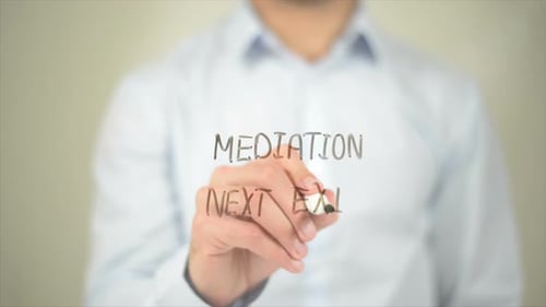 Writing Mediation Next Exit on Clear Surface