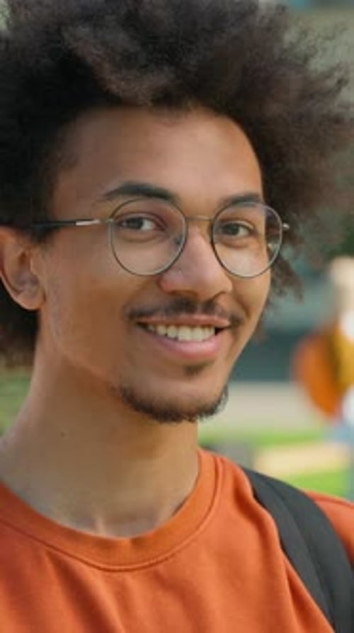 Portrait Positive African American Man Student Smiling Looking at Camera Outdoor University