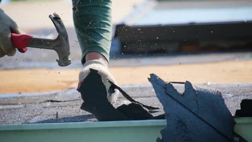 Roofer Dismantles Old Roof Covering Installing a New Roof on an House Work Elements